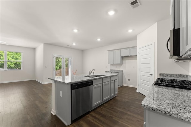 1278 Daurian Dr, Statham, GA 30666 - kitchen with appliances with stainless steel finishes, dark wood-style flooring, an island with sink, gray cabinets, and recessed lighting