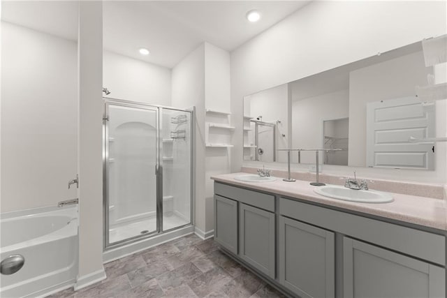 1278 Daurian Dr, Statham, GA 30666 - full bathroom featuring a shower stall, a garden tub, and double vanity
