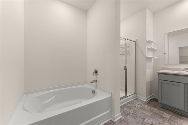 1278 Daurian Dr, Statham, GA 30666 - bathroom featuring a garden tub, a stall shower, and vanity