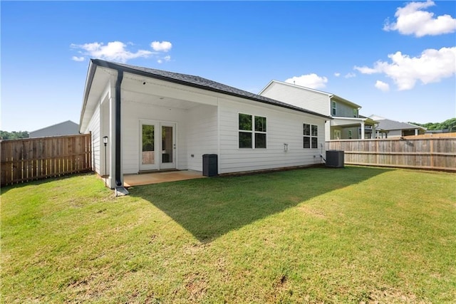 1278 Daurian Dr, Statham, GA 30666 - back of property with a fenced backyard and a patio