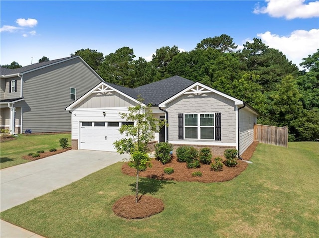 1278 Daurian Dr, Statham, GA 30666 - view of front facade featuring an attached garage, driveway, board and batten siding, and brick siding
