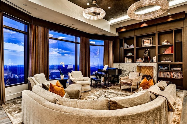 living room with built in features, wood finished floors, and recessed lighting