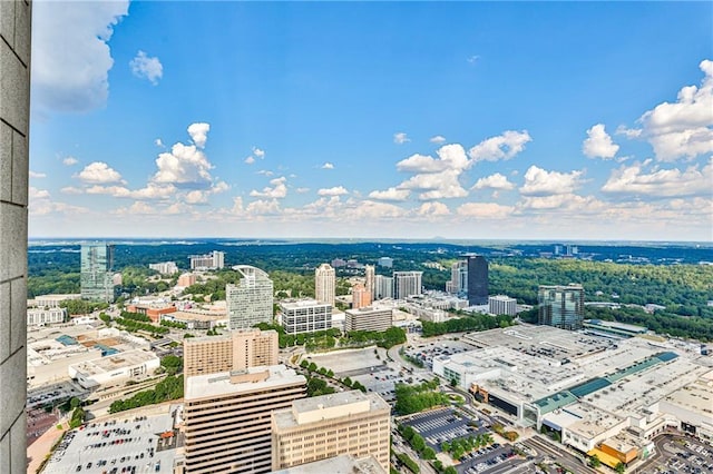 birds eye view of property featuring a city view