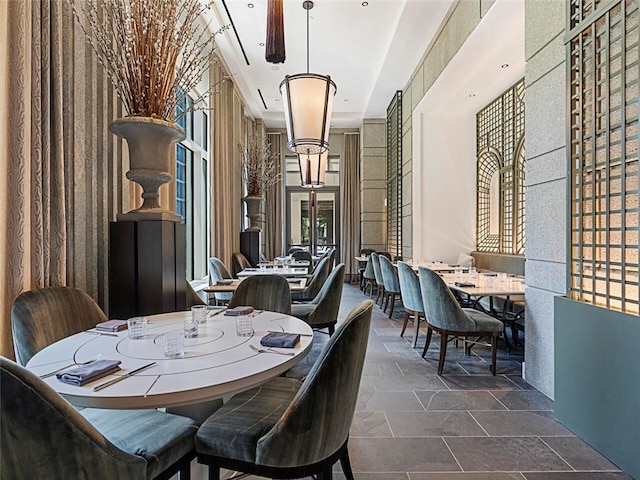 dining room featuring stone finish flooring