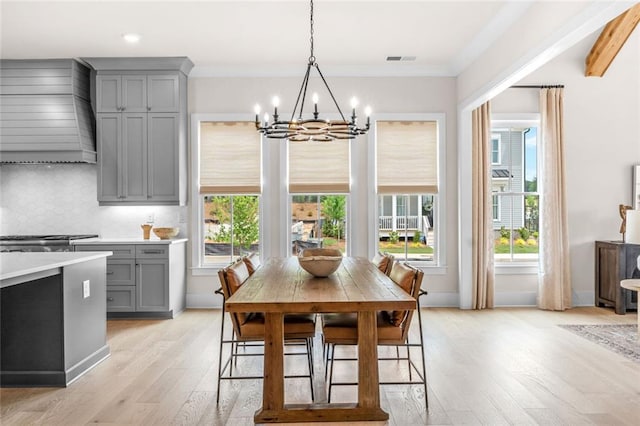 2031 Crossroads Trl, Milton, GA 30004 - dining area featuring a chandelier, healthy amount of natural light, light wood-style floors, ornamental molding, and recessed lighting