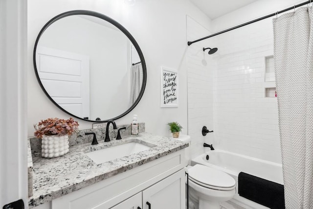 full bathroom featuring shower / bathtub combination with curtain, vanity, and toilet