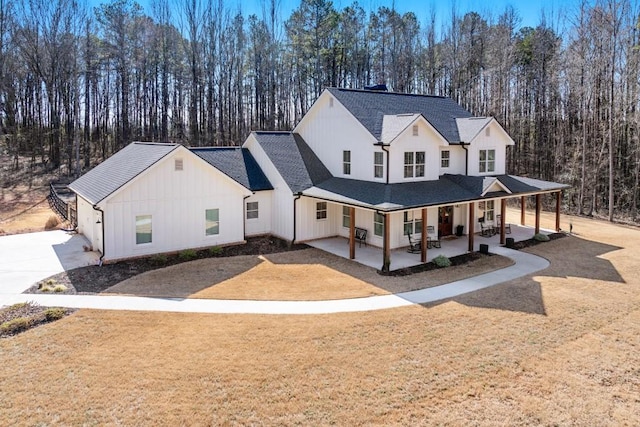 modern farmhouse style home featuring a porch