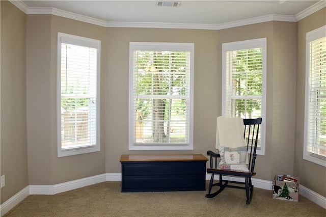265 Mona Ct, Winder, GA 30680 - living area with carpet flooring, crown molding, healthy amount of natural light, and baseboards
