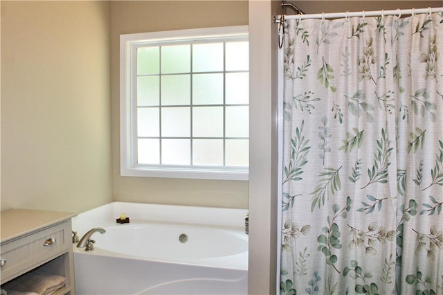 265 Mona Ct, Winder, GA 30680 - full bathroom featuring a garden tub and a shower with curtain