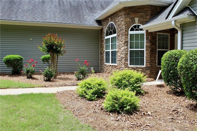 265 Mona Ct, Winder, GA 30680 - property entrance featuring stone siding and a shingled roof