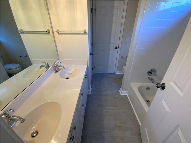 5055 Hickory Hills Dr, Woodstock, GA 30188 - bathroom with a sink, toilet, and double vanity