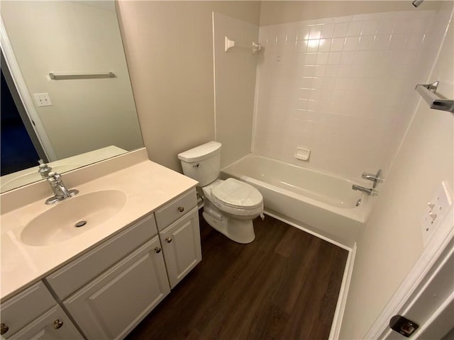 5055 Hickory Hills Dr, Woodstock, GA 30188 - full bathroom with shower / bath combination, toilet, wood finished floors, and vanity