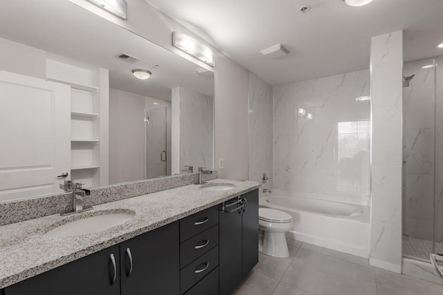 full bathroom featuring tile patterned floors, vanity, toilet, and independent shower and bath