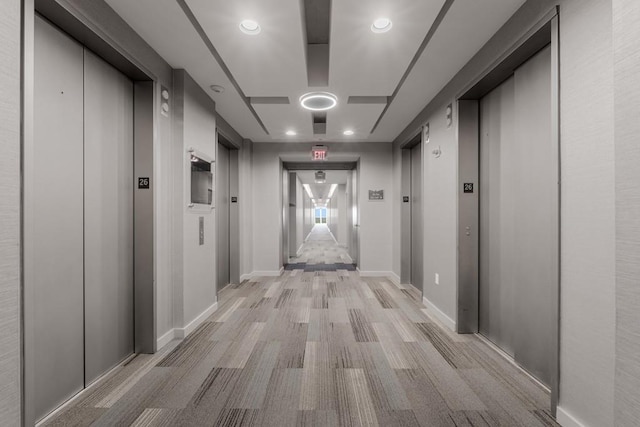 corridor featuring elevator