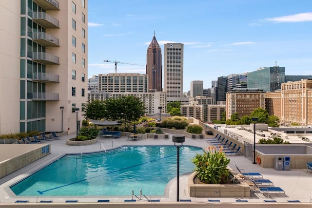 view of swimming pool featuring a patio