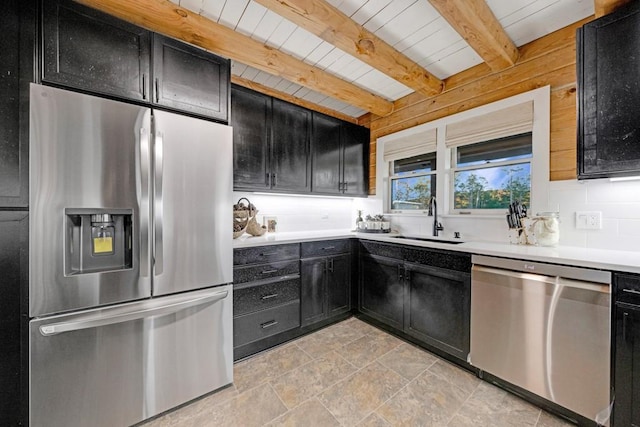 kitchen with decorative backsplash, appliances with stainless steel finishes, sink, wooden ceiling, and beamed ceiling