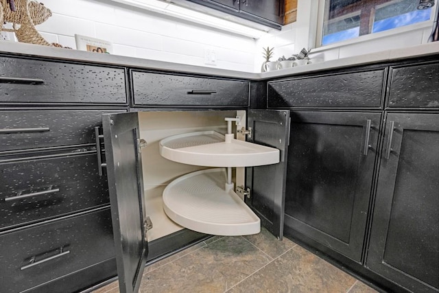 bathroom with tile patterned floors