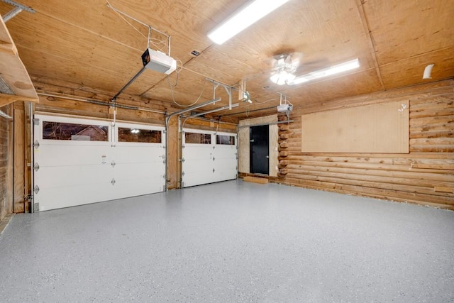 923 Pine Cir, Woodstock, GA 30189 - garage featuring a garage door opener