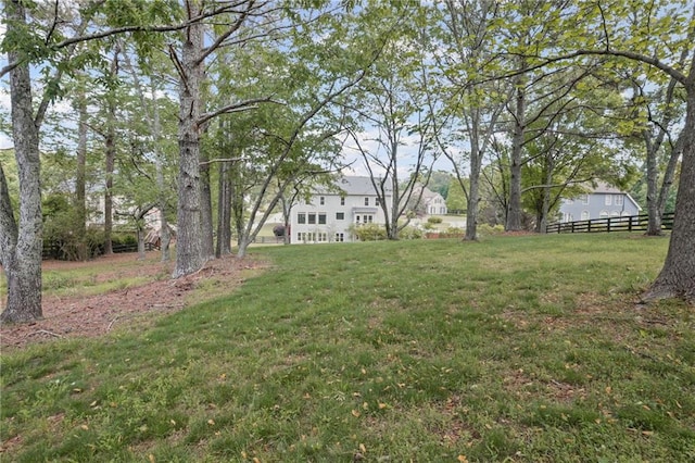 view of yard featuring fence
