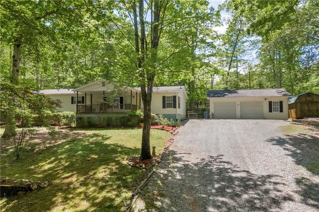 1437 Frank Lovell Rd, Clarkesville, GA 30523 - view of front of home featuring a porch, driveway, a garage, an outdoor structure, and a front lawn