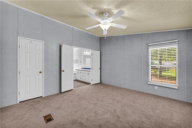 1437 Frank Lovell Rd, Clarkesville, GA 30523 - unfurnished bedroom featuring carpet floors, a ceiling fan, a textured ceiling, and crown molding