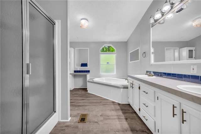 1437 Frank Lovell Rd, Clarkesville, GA 30523 - full bath with visible vents, a shower stall, a sink, and wood finished floors