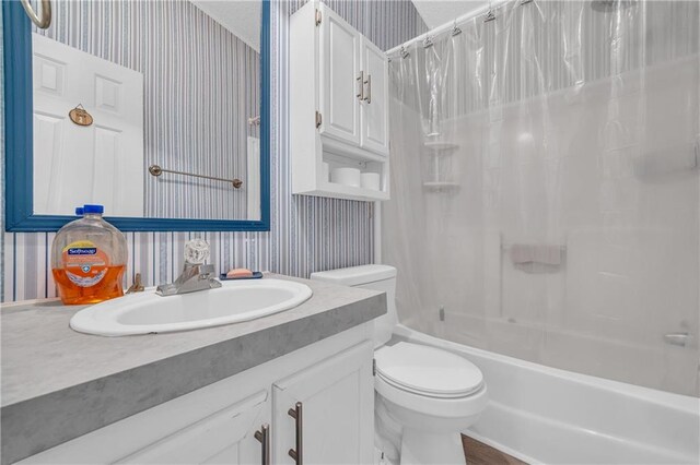 1437 Frank Lovell Rd, Clarkesville, GA 30523 - full bathroom featuring vanity, shower / bath combo, toilet, and wallpapered walls