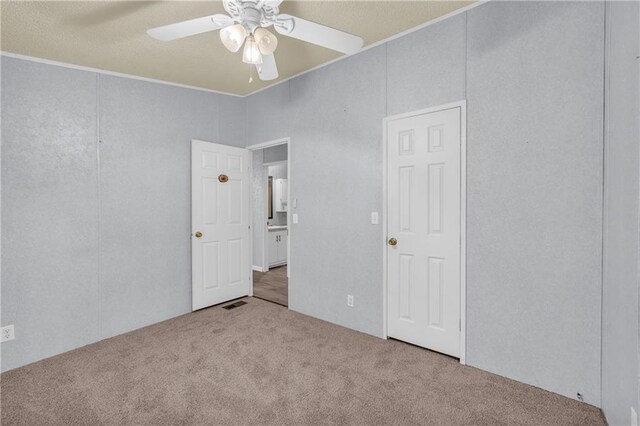 1437 Frank Lovell Rd, Clarkesville, GA 30523 - unfurnished bedroom featuring a ceiling fan and carpet flooring