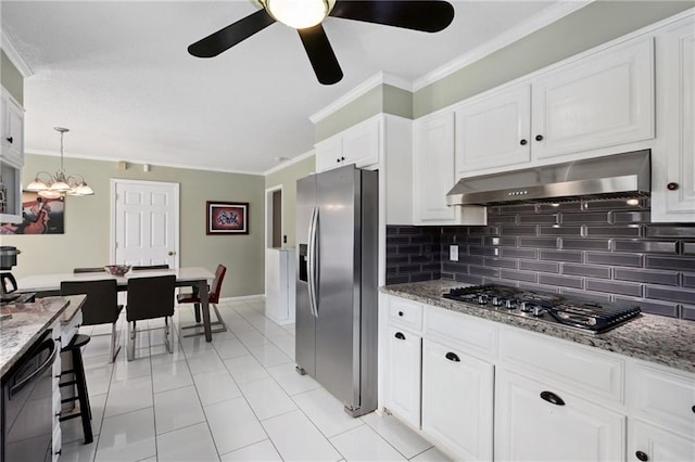 210 N Wesleyan Cir, Macon, GA 31210 - kitchen with stainless steel appliances, under cabinet range hood, crown molding, ceiling fan, and tasteful backsplash