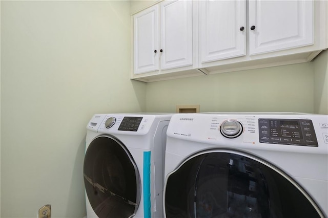 210 N Wesleyan Cir, Macon, GA 31210 - laundry room with cabinet space and washing machine and clothes dryer