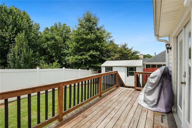 210 N Wesleyan Cir, Macon, GA 31210 - deck with a fenced backyard and an outbuilding
