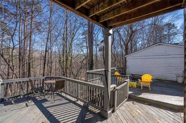 deck featuring an outbuilding