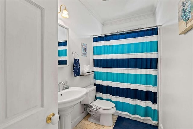 bathroom featuring tile patterned flooring, toilet, crown molding, and walk in shower