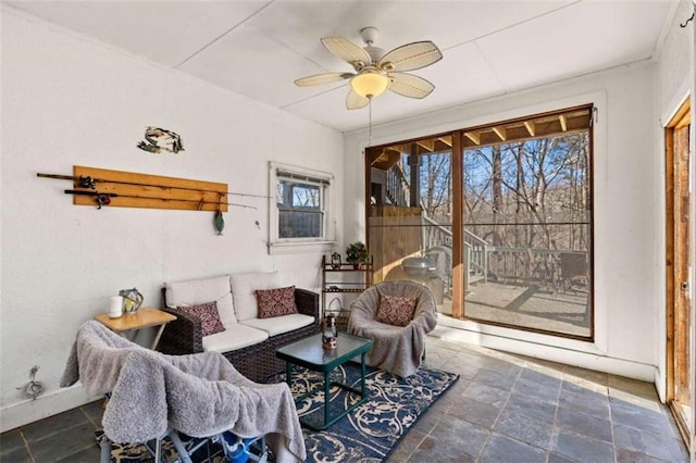 interior space featuring ceiling fan