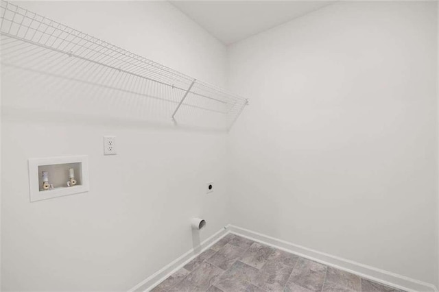 laundry area featuring washer hookup, laundry area, baseboards, and electric dryer hookup