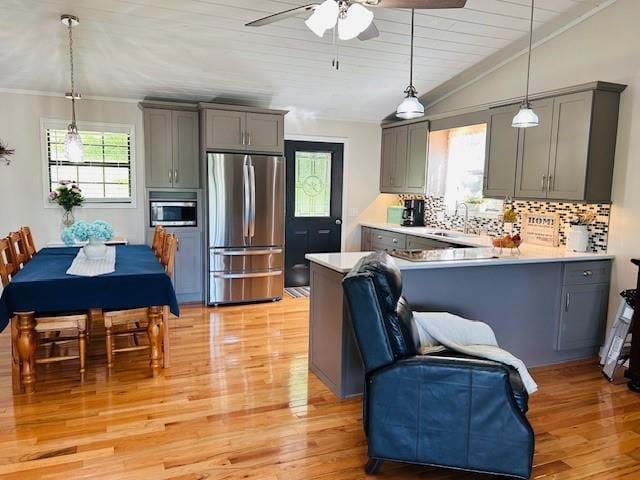 1008 Lakeview Acres, Hiawassee, GA 30546 - kitchen with appliances with stainless steel finishes, gray cabinetry, a ceiling fan, light countertops, and lofted ceiling