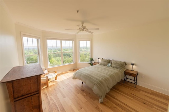 4100 Paces Walk SE Unit 4306, Atlanta, GA 30339 - bedroom with light wood finished floors, ornamental molding, baseboards, and ceiling fan