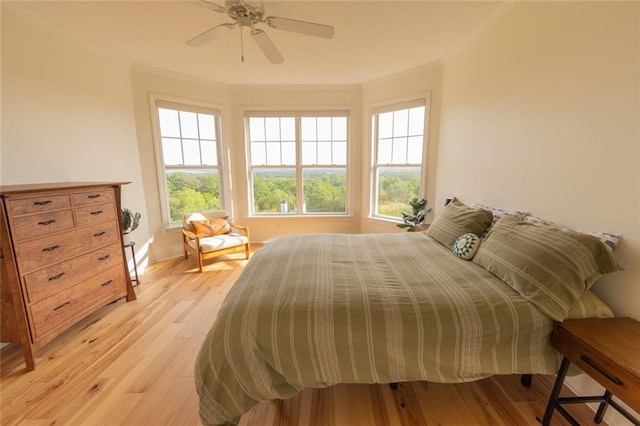4100 Paces Walk SE Unit 4306, Atlanta, GA 30339 - bedroom featuring ornamental molding, light wood-style floors, and a ceiling fan