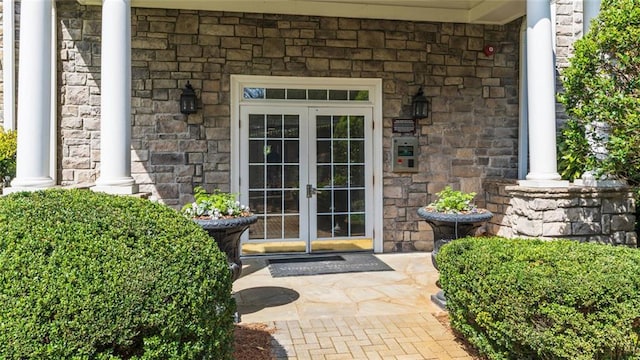 4100 Paces Walk SE Unit 4306, Atlanta, GA 30339 - view of exterior entry with french doors and stone siding