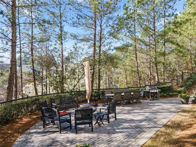 4100 Paces Walk SE Unit 4306, Atlanta, GA 30339 - view of patio with outdoor dining area and an outdoor living space