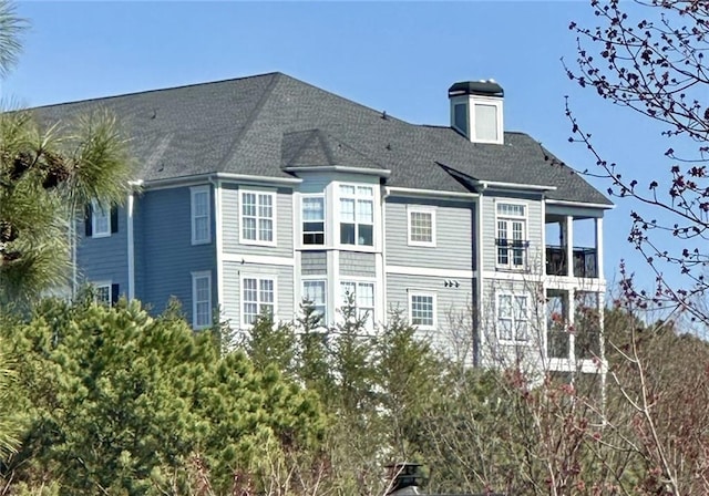 4100 Paces Walk SE Unit 4306, Atlanta, GA 30339 - back of house featuring roof with shingles