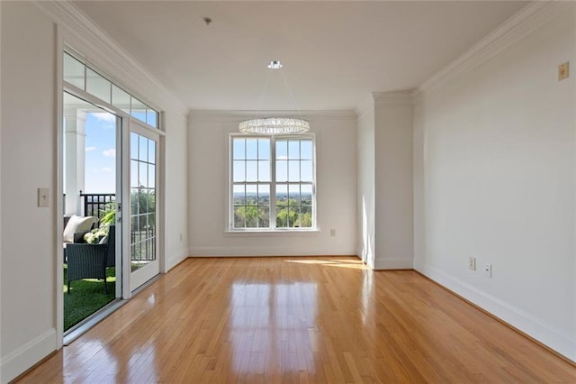 4100 Paces Walk SE Unit 4306, Atlanta, GA 30339 - unfurnished room with crown molding, a chandelier, and wood finished floors