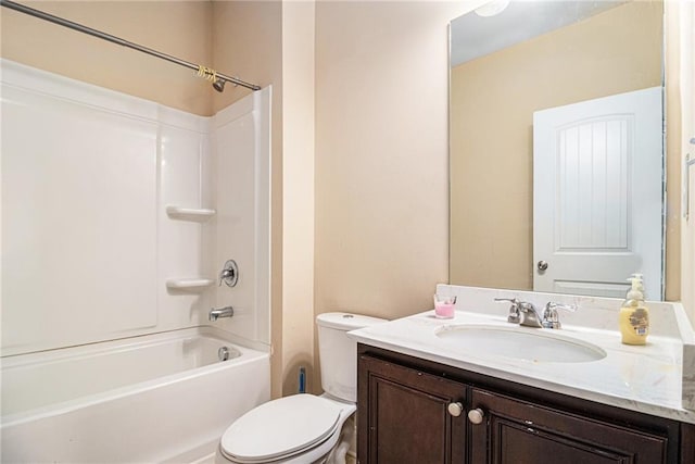 bathroom with shower / tub combination, toilet, and vanity