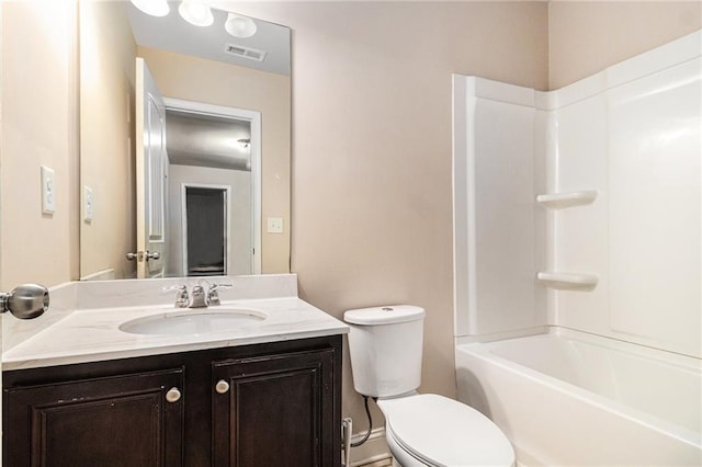 bathroom featuring vanity, toilet, visible vents, and shower / bath combination