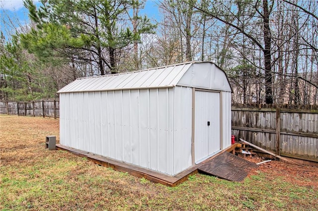 view of shed featuring a fenced backyard