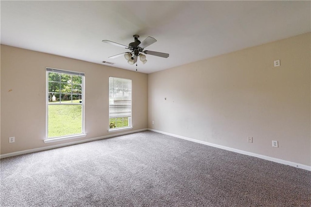 10247 Deep Creek Pl, Union City, GA 30291 - spare room featuring carpet, a ceiling fan, and baseboards