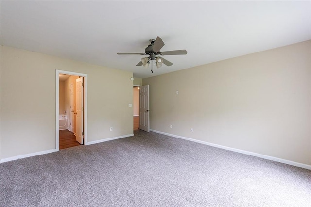 10247 Deep Creek Pl, Union City, GA 30291 - unfurnished bedroom featuring carpet floors, baseboards, ceiling fan, and ensuite bathroom