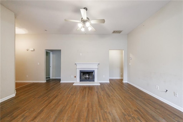 10247 Deep Creek Pl, Union City, GA 30291 - unfurnished living room with ceiling fan, wood finished floors, a fireplace with raised hearth, and baseboards