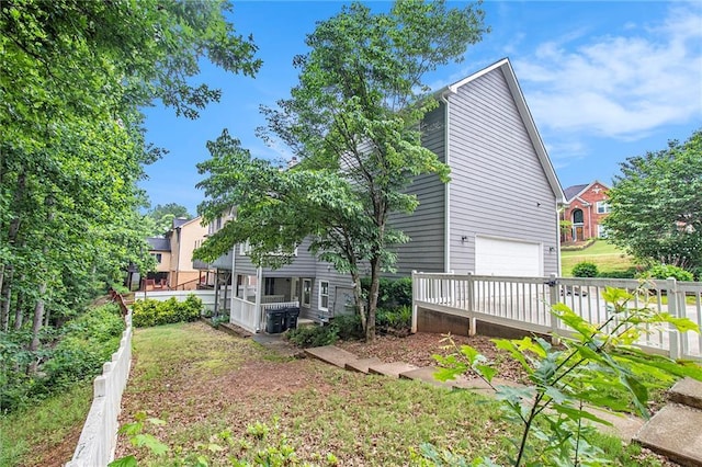 200 Ridge Bluff Ln, Suwanee, GA 30024 - back of house featuring a garage