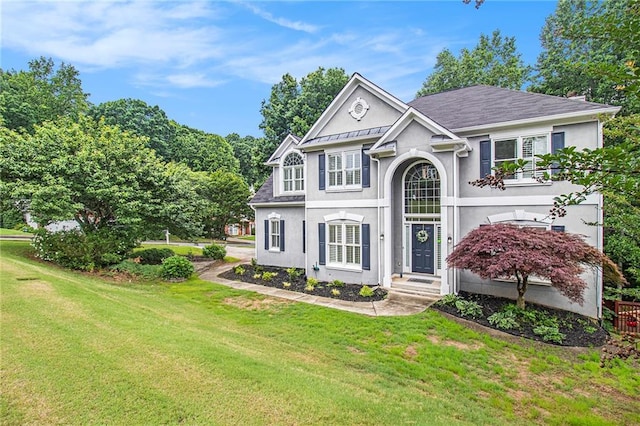 200 Ridge Bluff Ln, Suwanee, GA 30024 - view of front of house featuring stucco siding and a front yard